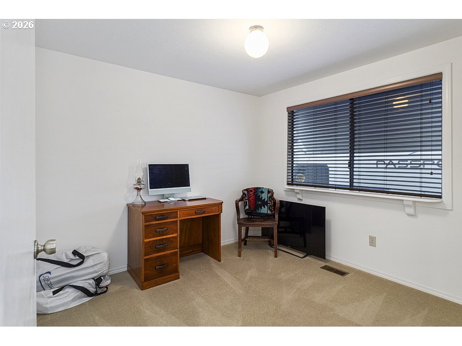 3788 Southeast 25th Street Gresham, OR 97080 - Photo 21 of 35 a room with furniture and a window