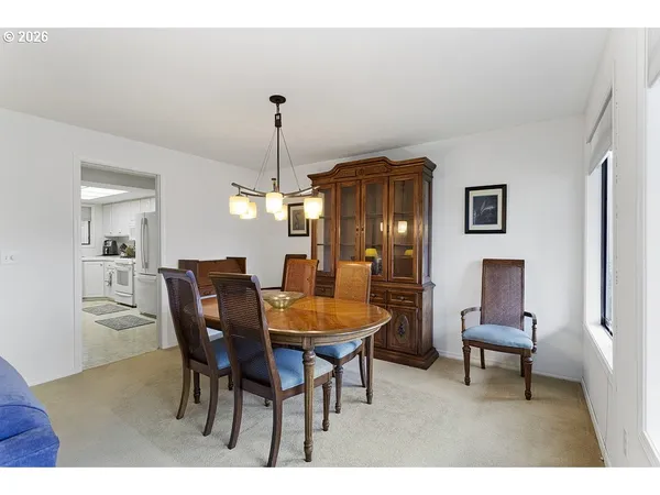 a view of a dining room with furniture