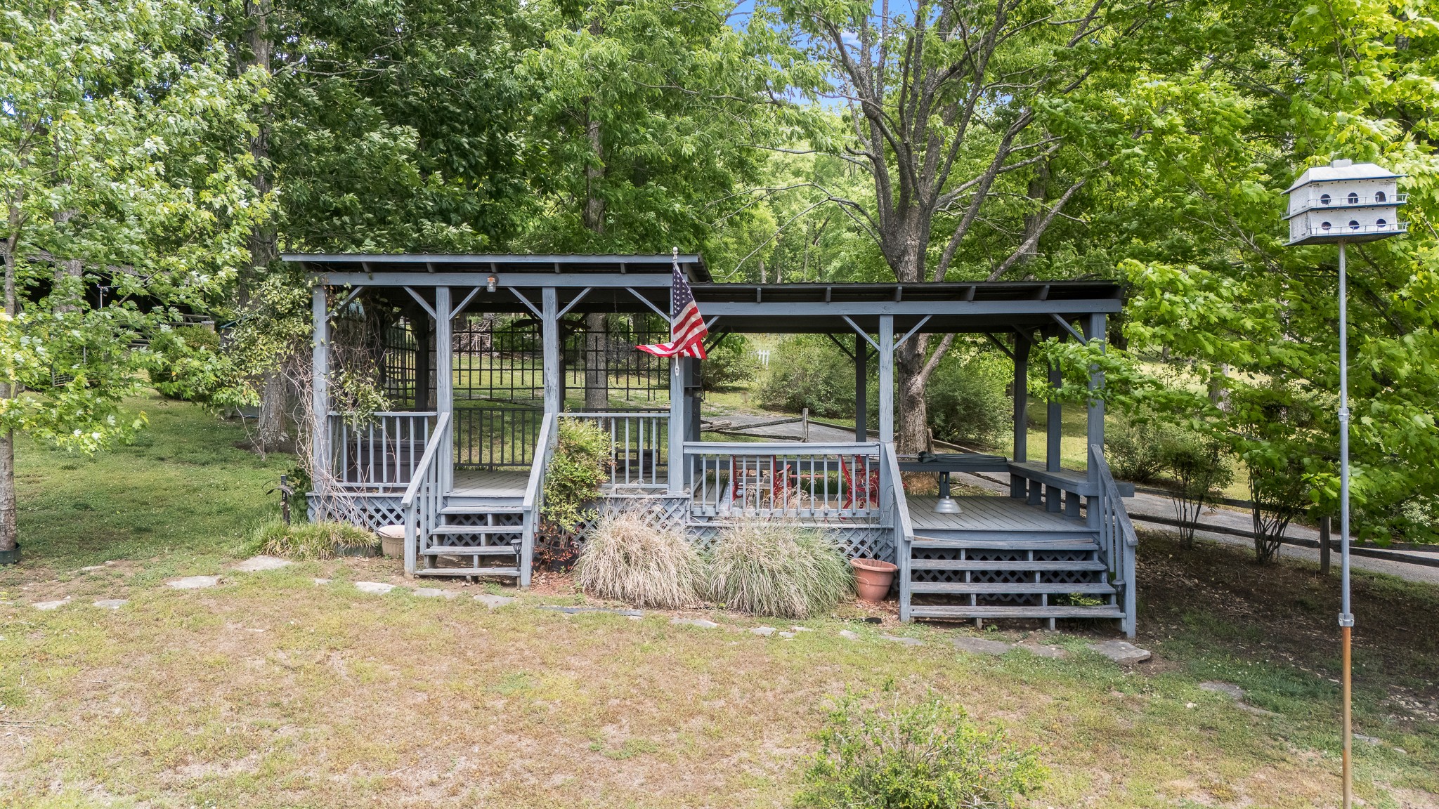 32 Grisham Road Fayetteville, TN 37334 - Photo 9 of 15 a view of backyard with green space and deck