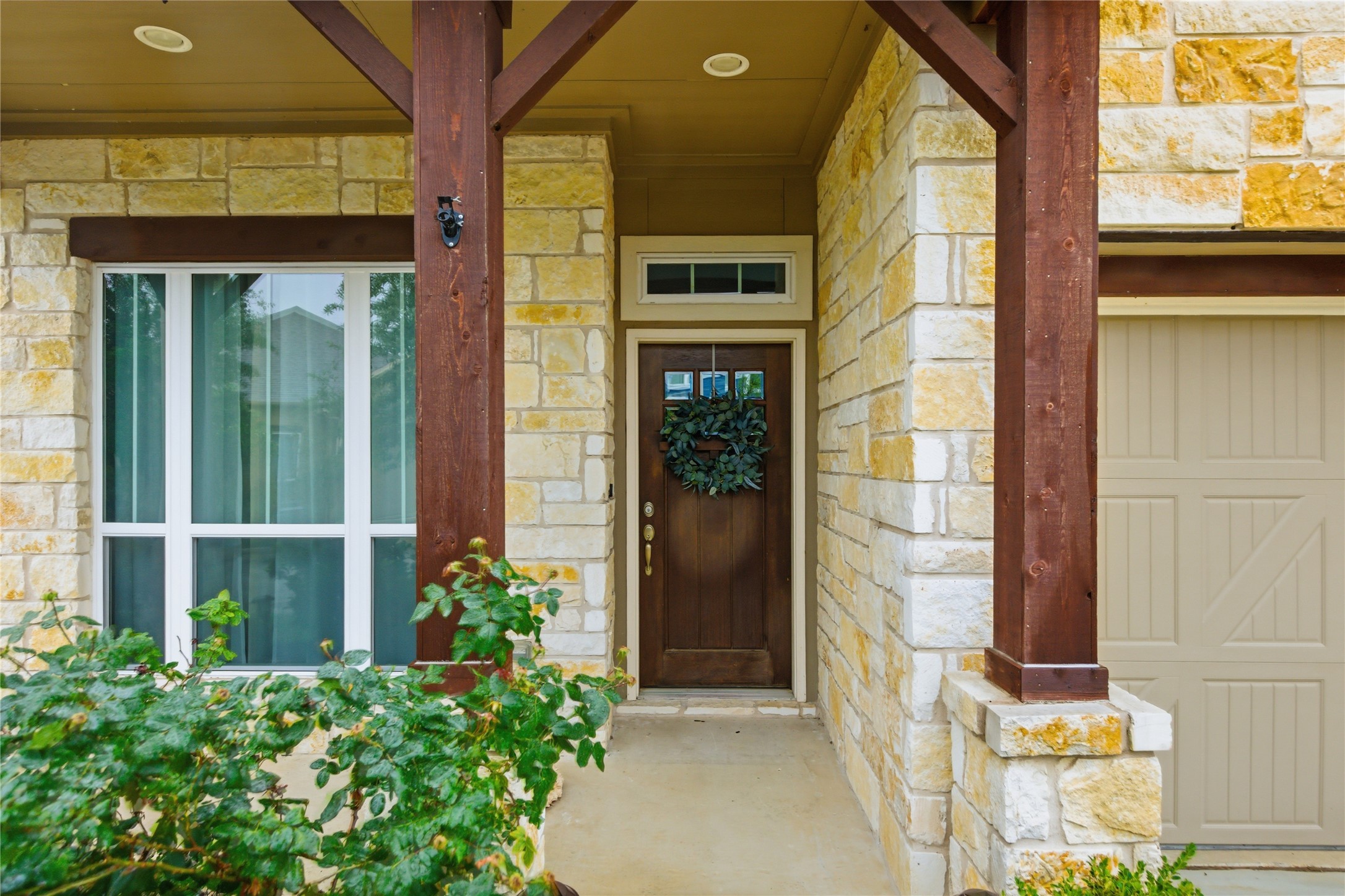 1300 Harwell Loop Kyle, TX 78640 - Photo 2 of 21 a potted plant in front of a building