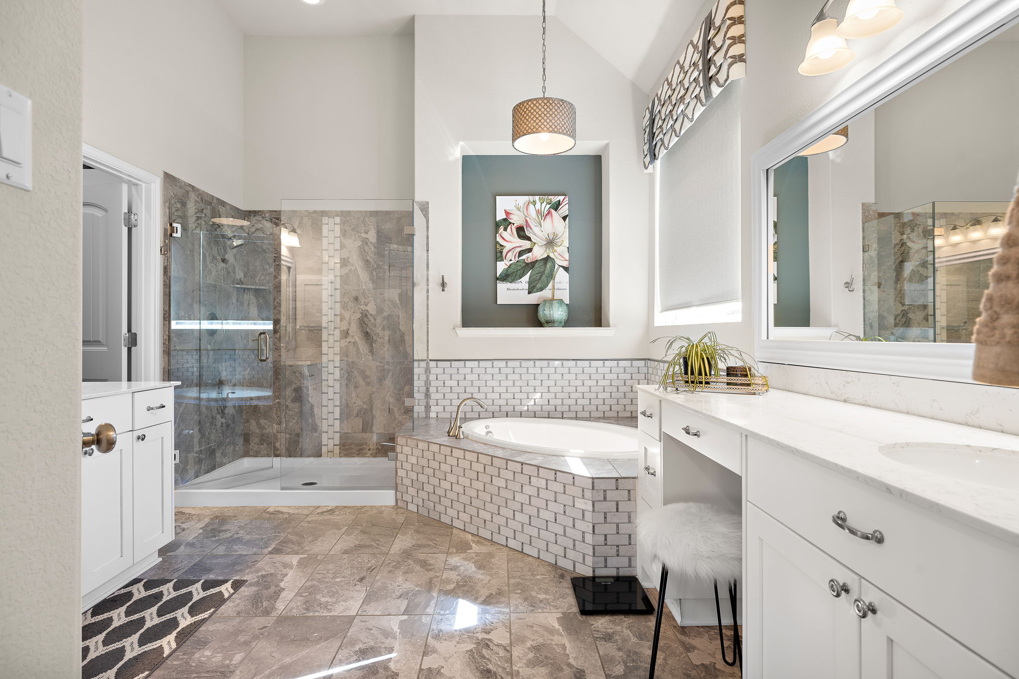 5016 Yucca Flower Lane Georgetown, TX 78626 - Photo 16 of 31 a bathroom with a tub sink and mirror