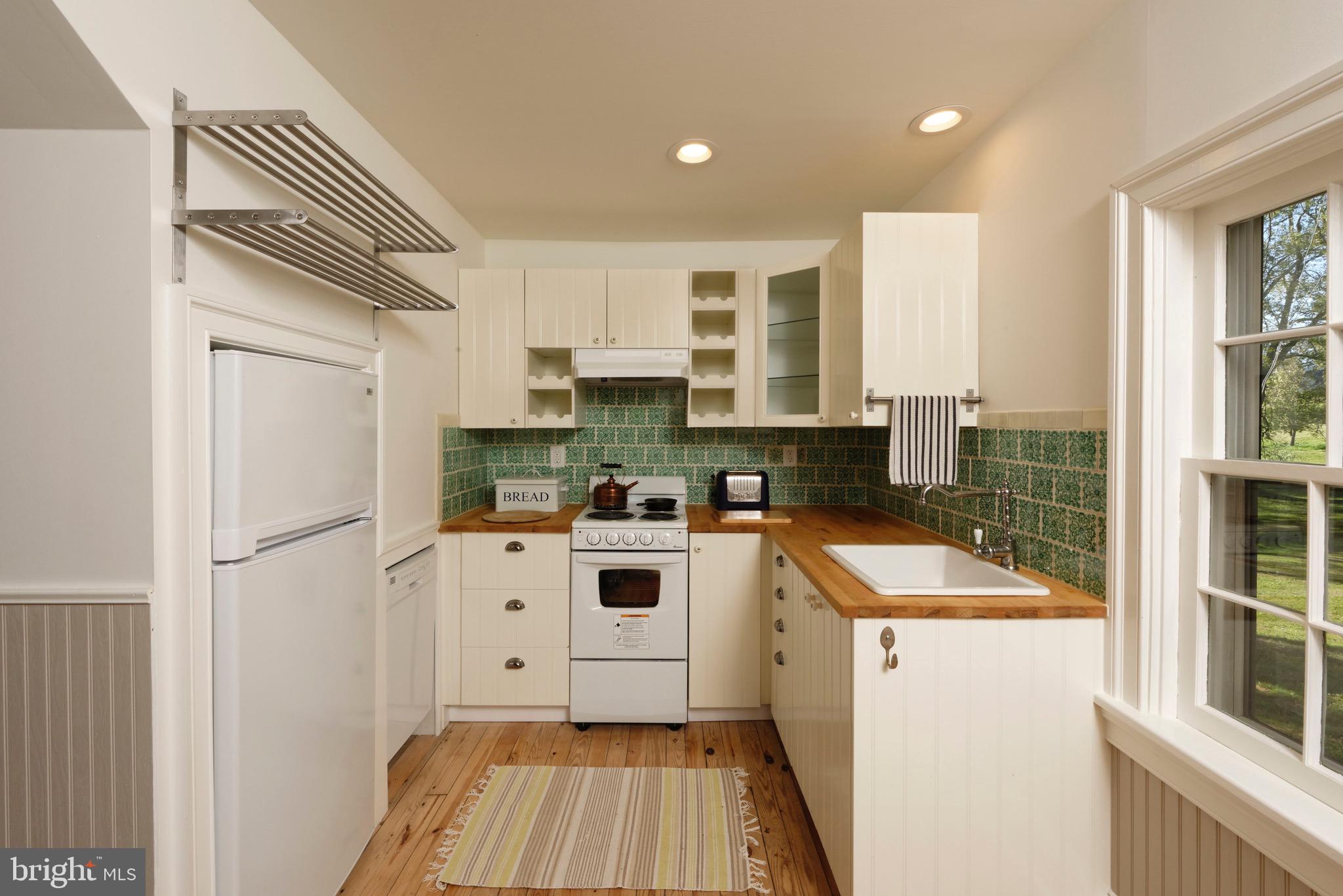 21896 Pot House Road Middleburg, VA 20117 - Photo 42 of 70 Remodeled kitchen w/Mexican tile backsplash
