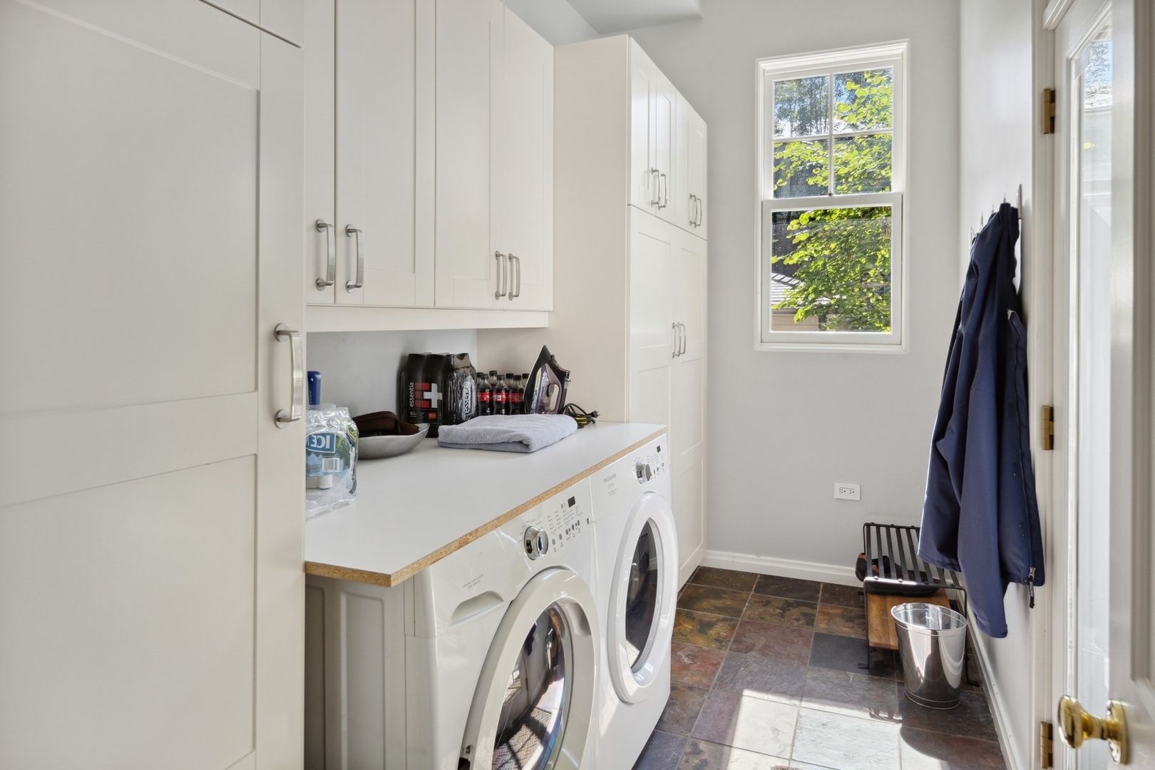 415 East Deerpath Road Lake Forest, IL 60045 - Photo 13 of 26 a view of storage and utility room with washer and dryer