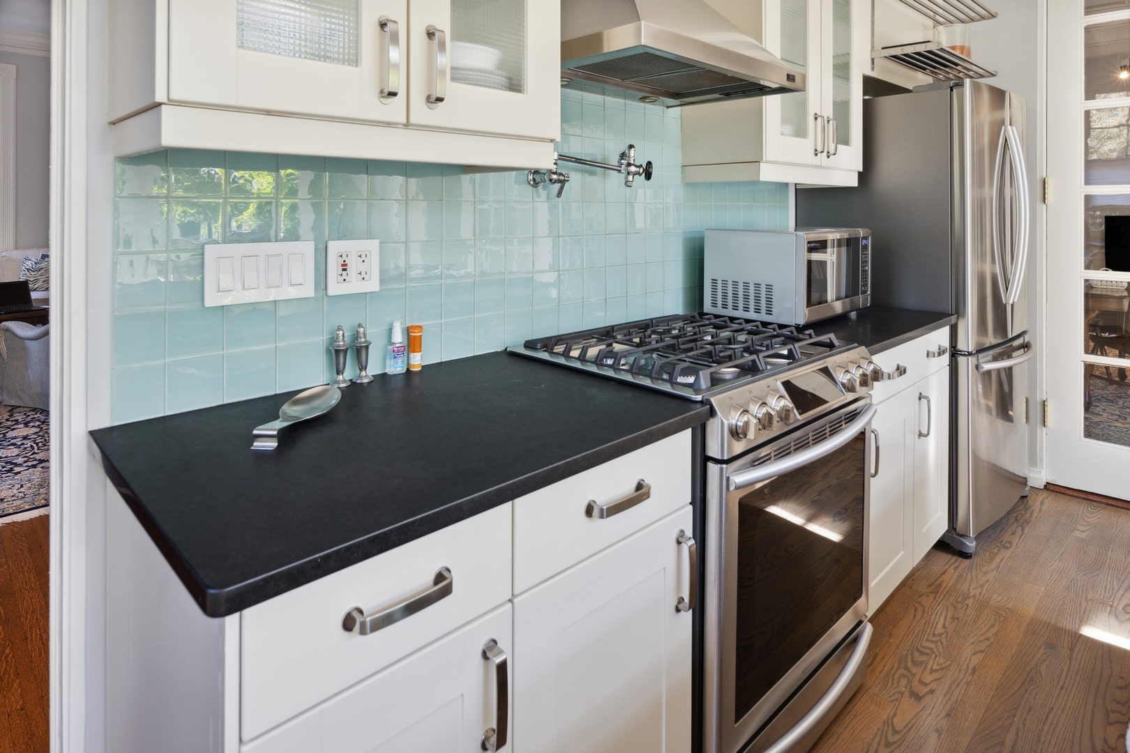 415 East Deerpath Road Lake Forest, IL 60045 - Photo 10 of 26 a kitchen with granite countertop a stove and a sink