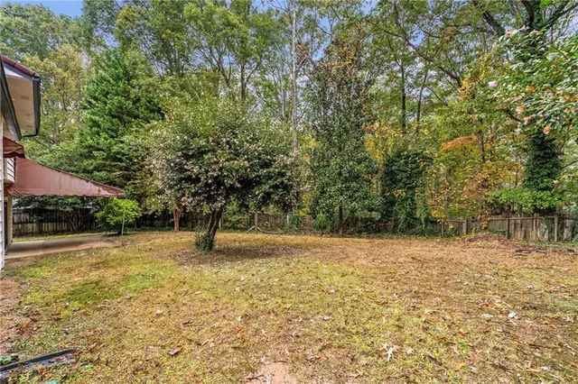 a house with trees in front of it