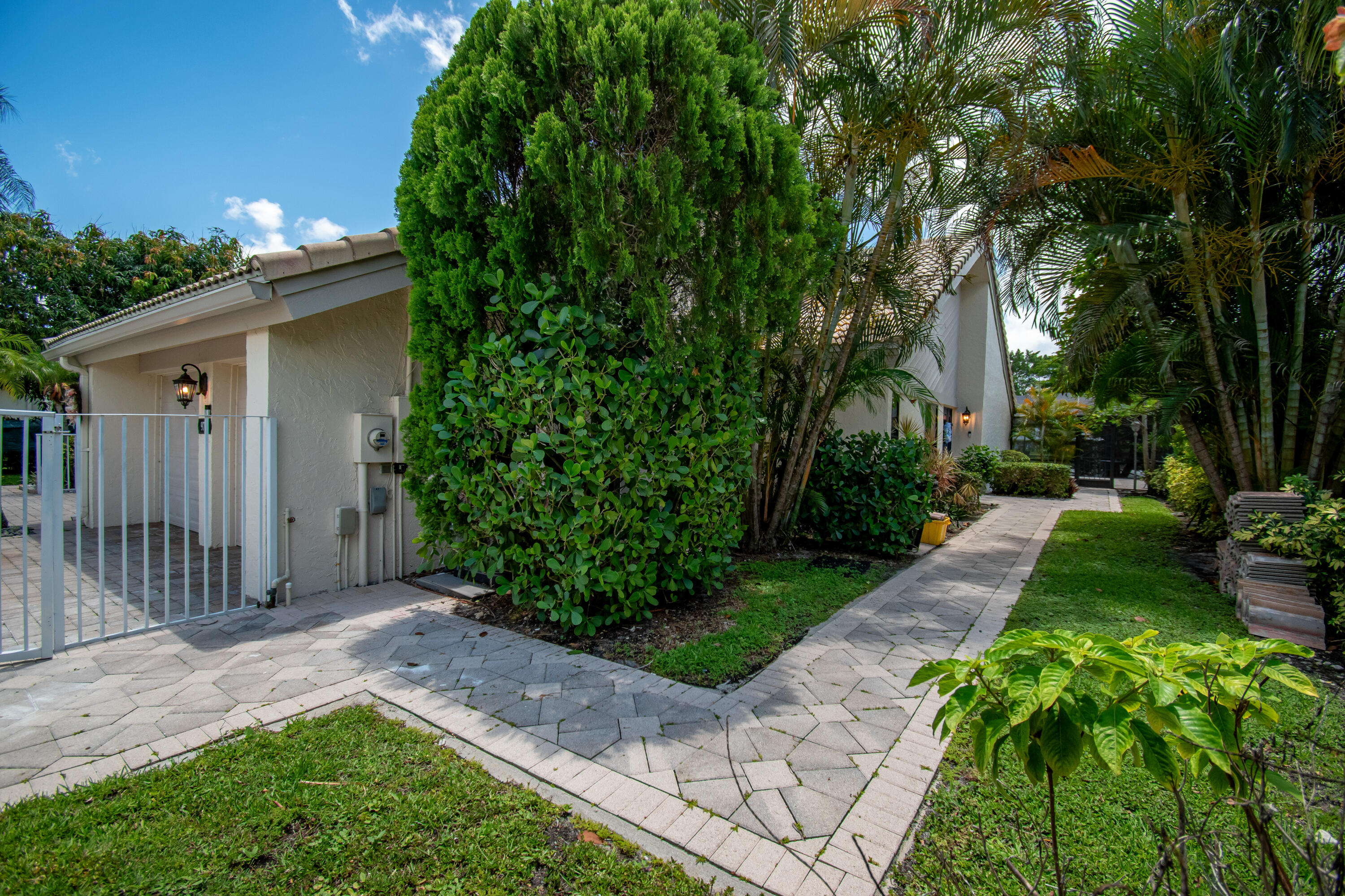 9708 Erica Court Boca Raton, FL 33496 - Photo 6 of 54 a view of a house with a yard