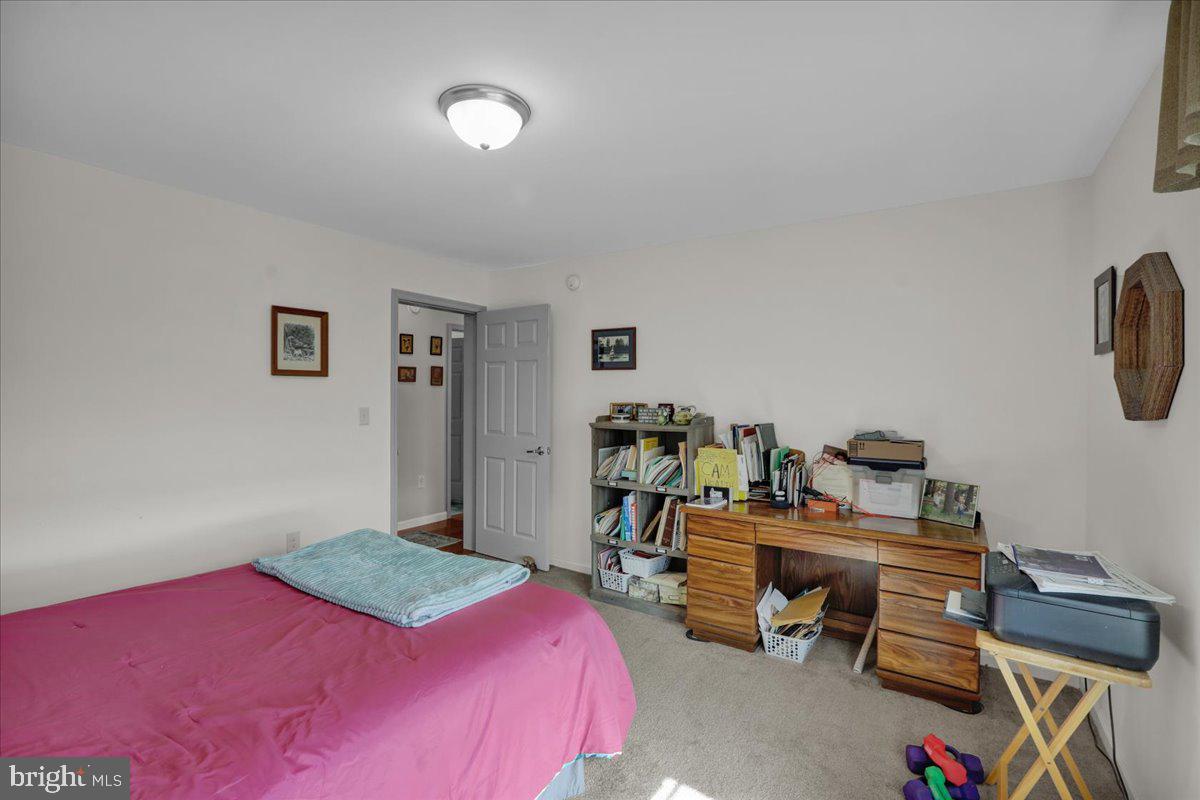 132 Strausser Road Hamburg, PA 19526 - Photo 21 of 67 a bedroom with a bed and a desk in it
