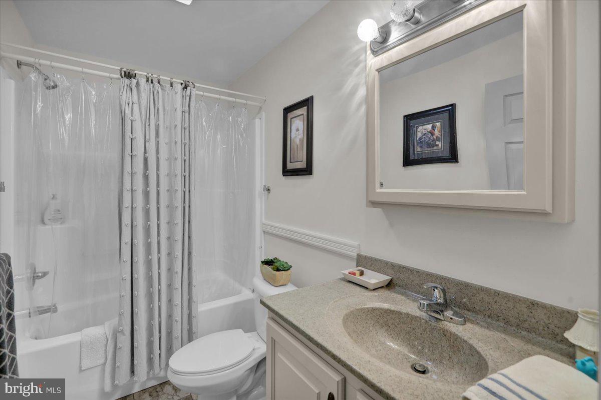 132 Strausser Road Hamburg, PA 19526 - Photo 22 of 67 a bathroom with a sink toilet a mirror and shower