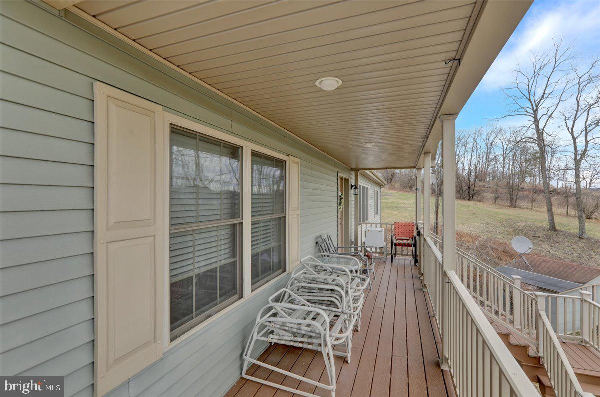 132 Strausser Road Hamburg, PA 19526 - Photo 45 of 67 a view of a patio with a table and chairs