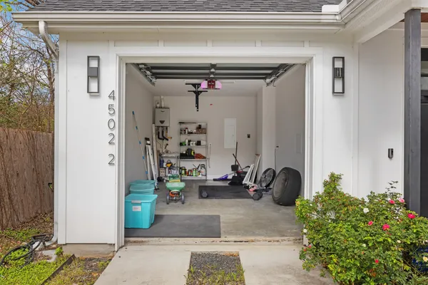 a view of living room filled with furniture and a potted plant