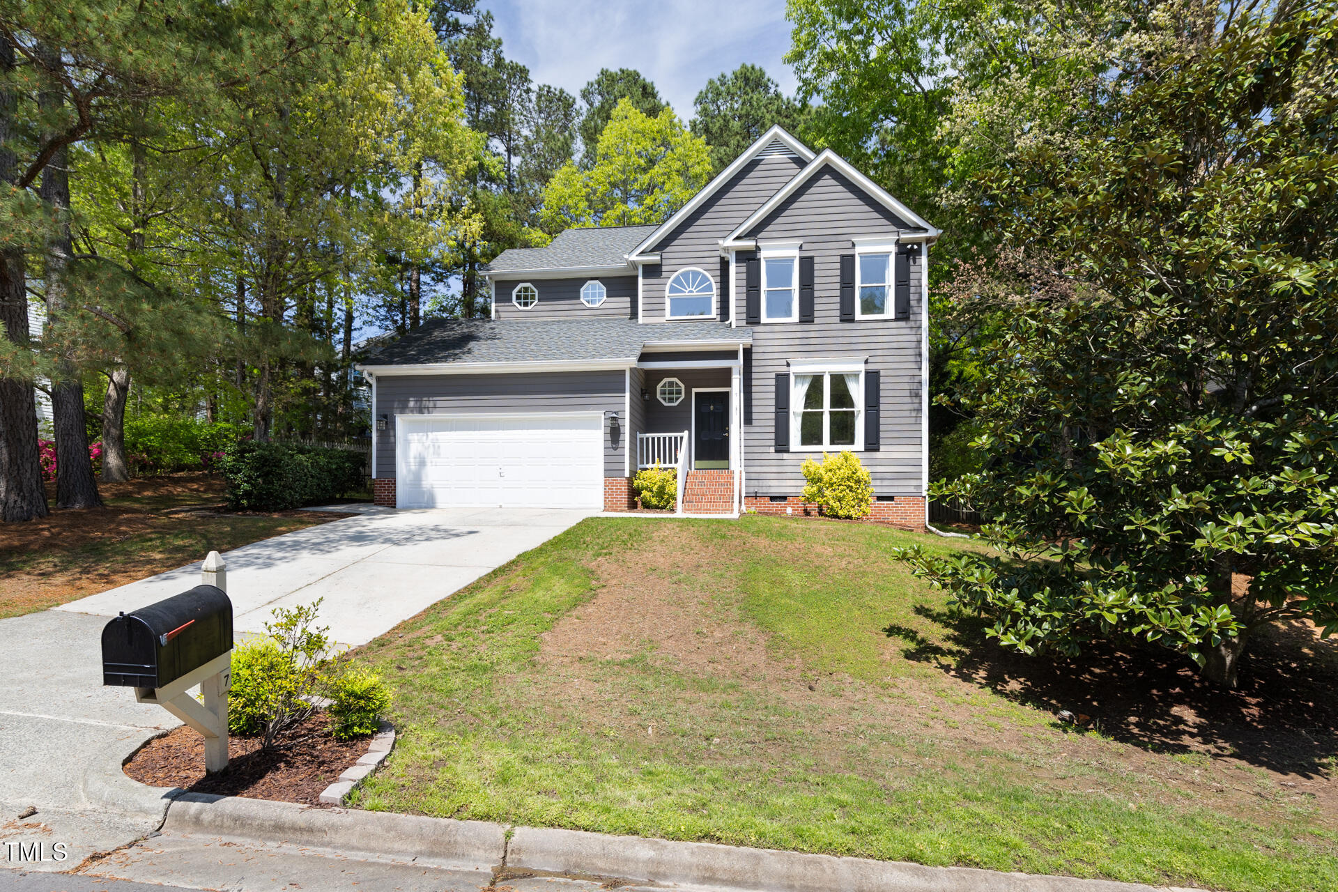 7 Wythebrook Lane Durham, NC 27713 - Photo 1 of 34 a front view of a house with garden