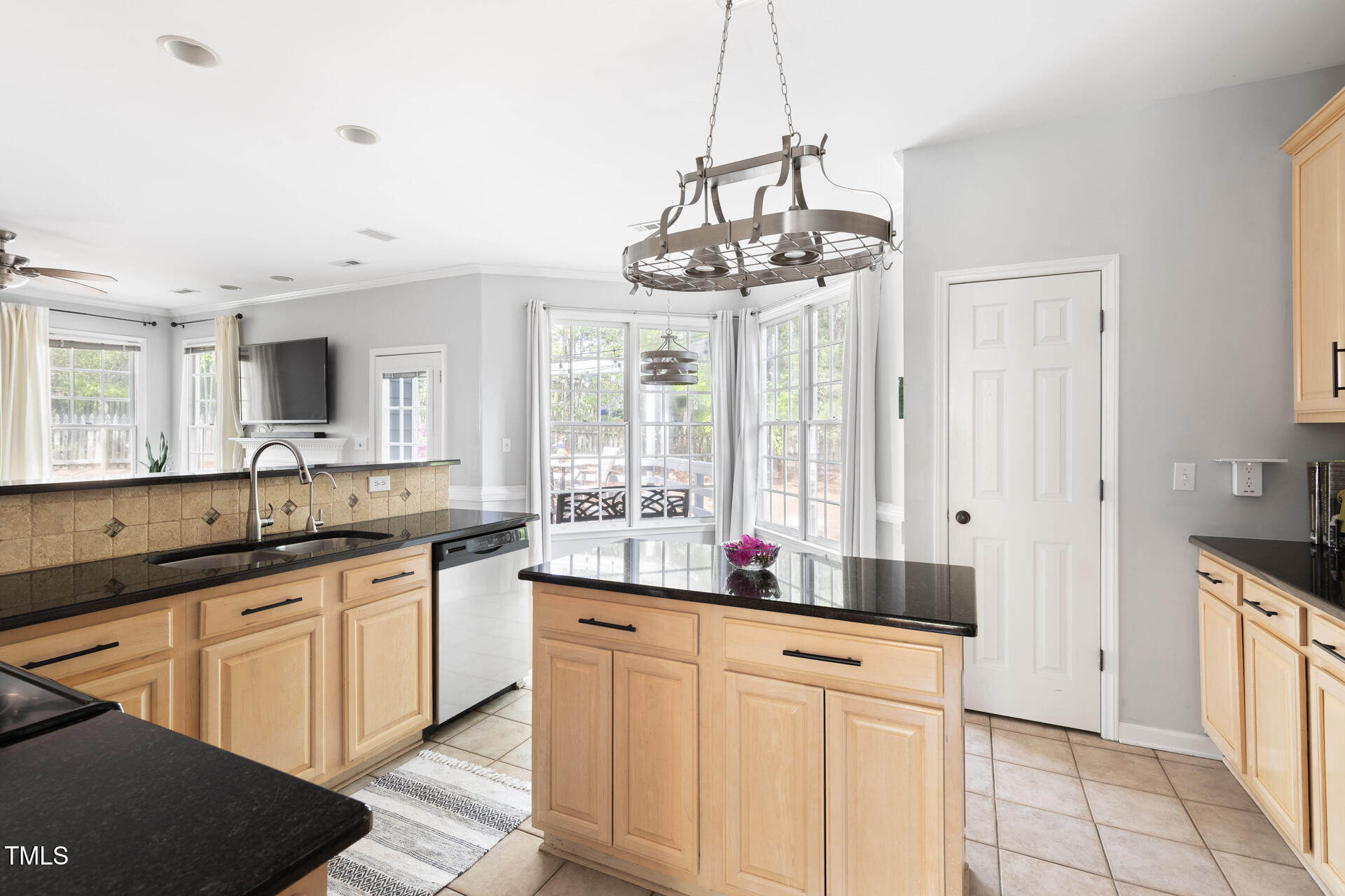 7 Wythebrook Lane Durham, NC 27713 - Photo 12 of 34 a kitchen with stainless steel appliances granite countertop a sink and cabinets