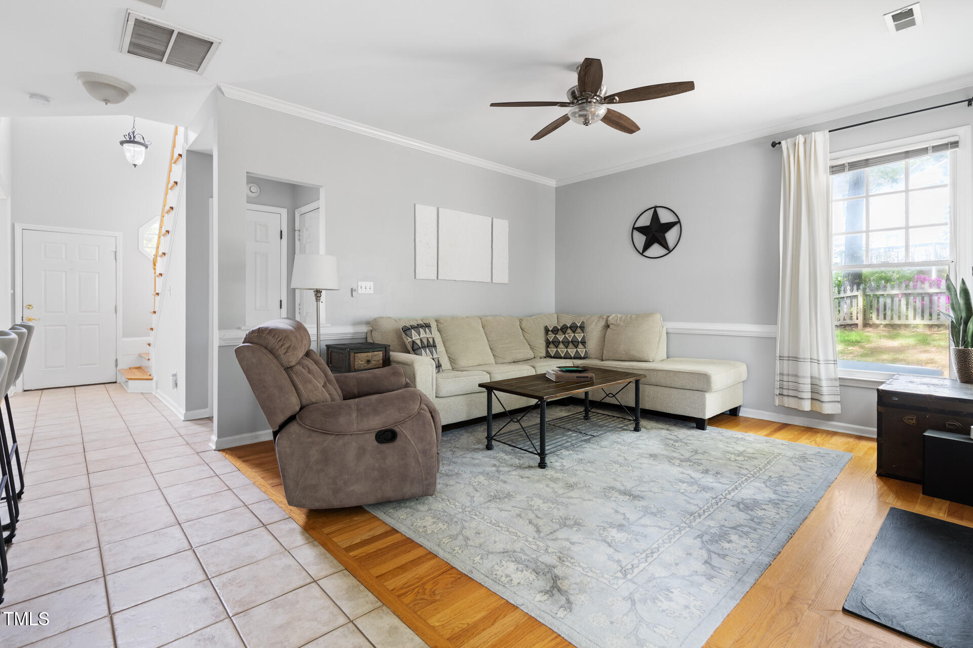 7 Wythebrook Lane Durham, NC 27713 - Photo 15 of 34 a living room with furniture and a rug