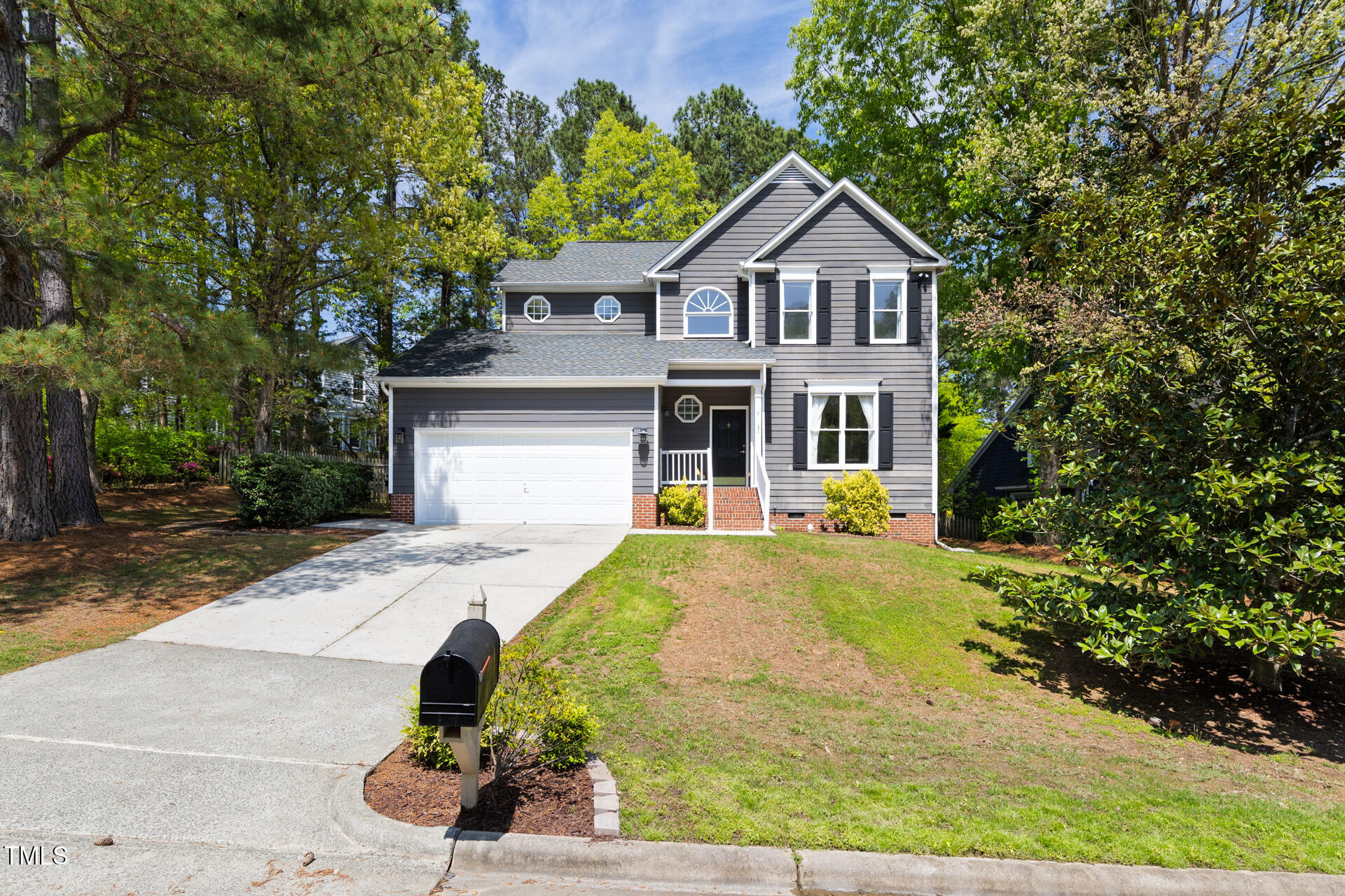 7 Wythebrook Lane Durham, NC 27713 - Photo 3 of 34 a front view of a house with a garden