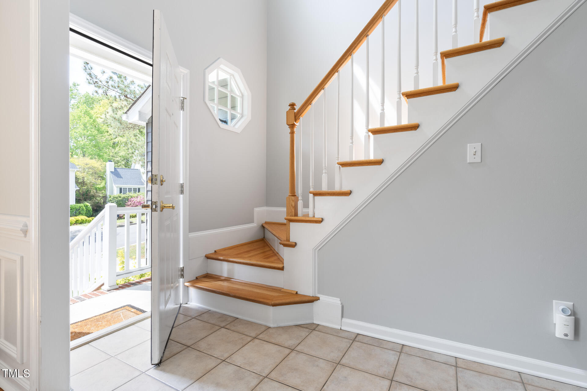 7 Wythebrook Lane Durham, NC 27713 - Photo 5 of 34 a view of entryway with wooden floor and door