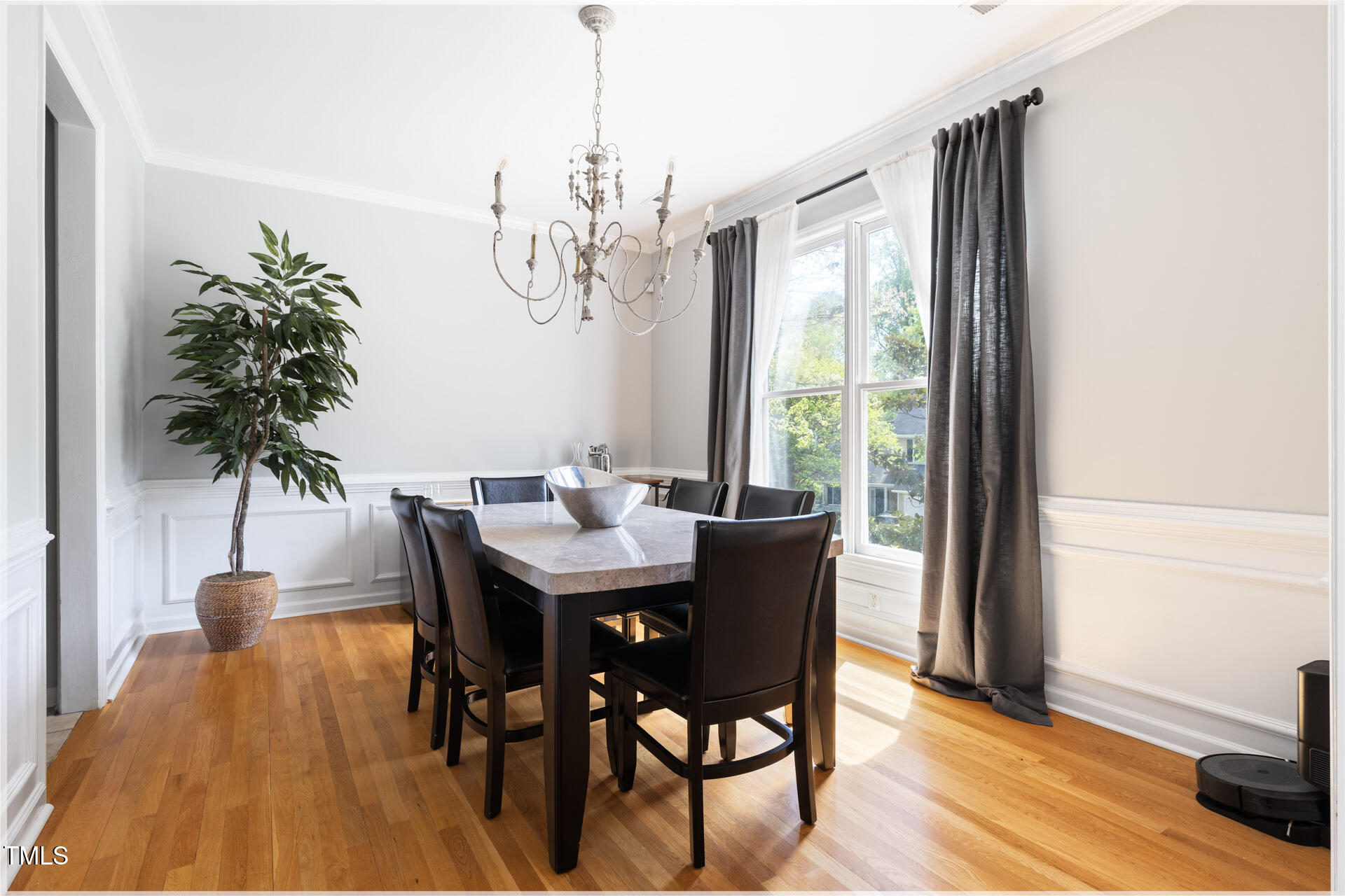 7 Wythebrook Lane Durham, NC 27713 - Photo 6 of 34 a view of a dining room with furniture window and wooden floor
