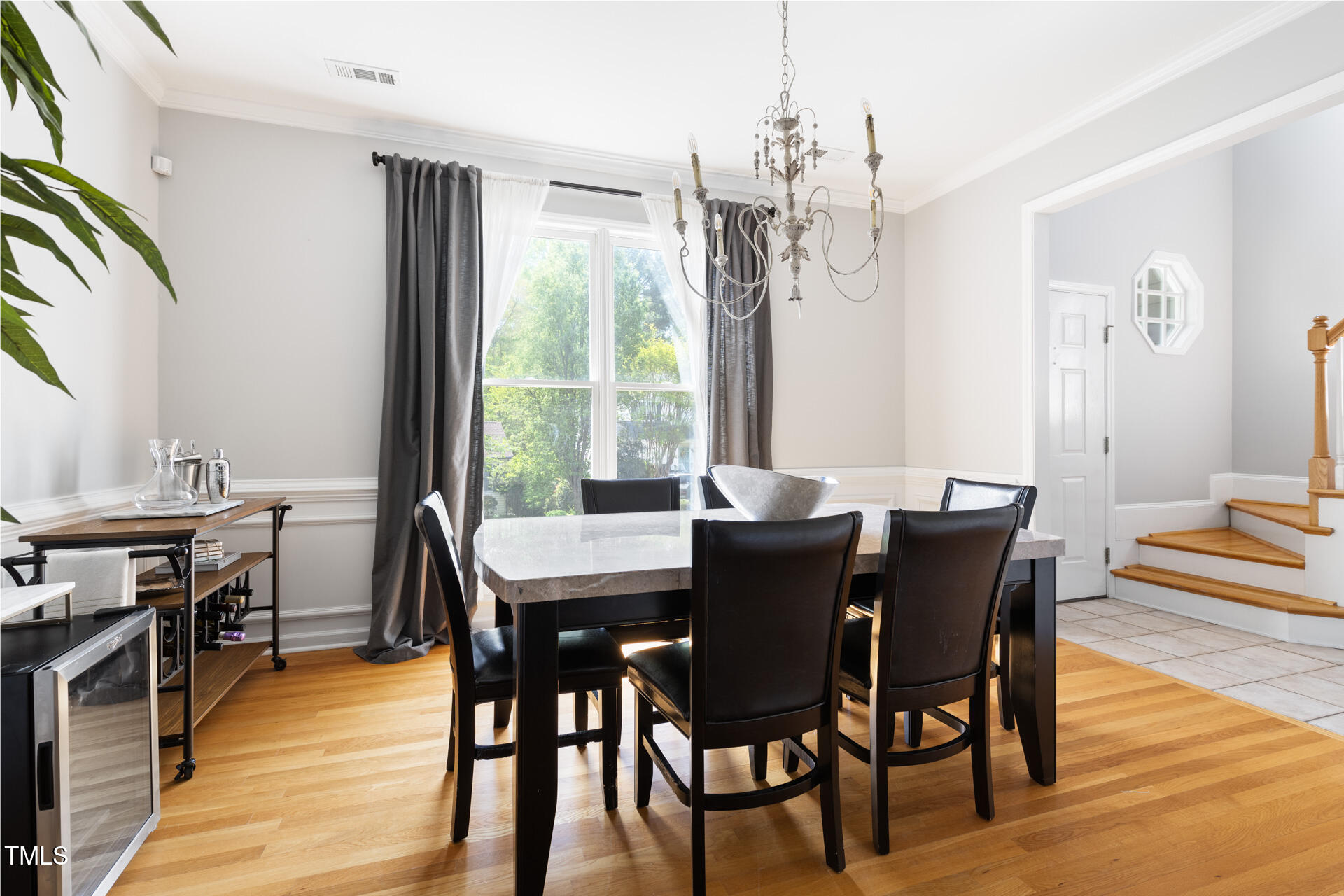 7 Wythebrook Lane Durham, NC 27713 - Photo 7 of 34 a view of a dining room with furniture window and wooden floor