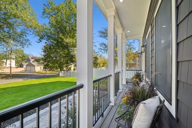 a view of a balcony with garden