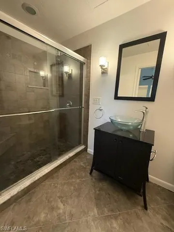 a bathroom with a bathtub and a sink