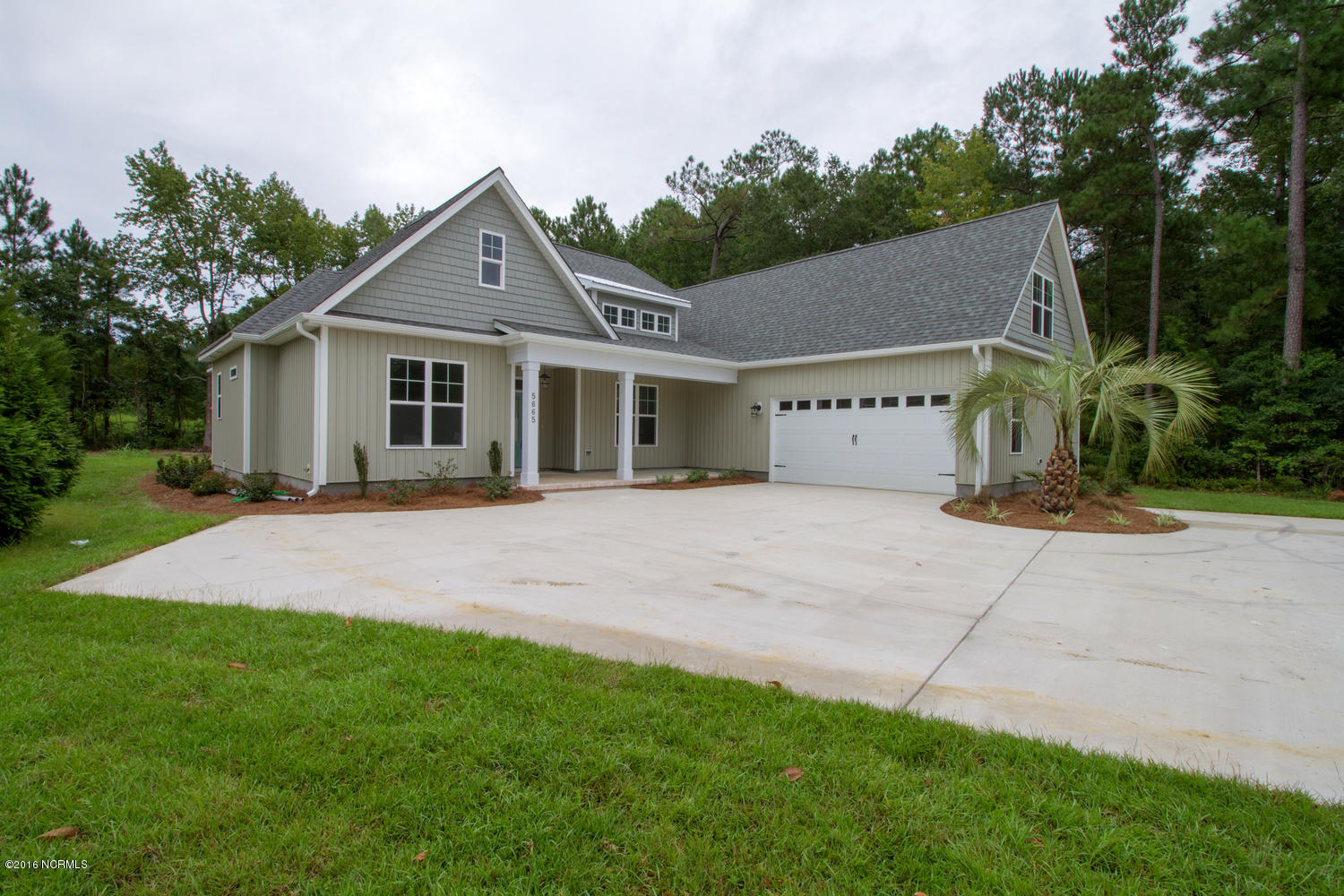 5665 Greenville Loop Road Wilmington, NC 28409 - Photo 2 of 7 5665 Greenville Loop Rd-large-002-2-Fron