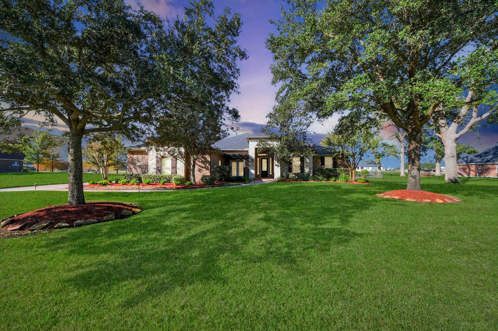 3511 River Bend Drive Rosenberg, TX 77471 - Photo 48 of 50 Elegant nighttime view of the home's front exterior.