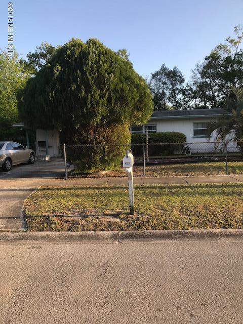 7606 Rambler Road Jacksonville, FL 32244 - Photo 1 of 1 a view of a yard with large tree