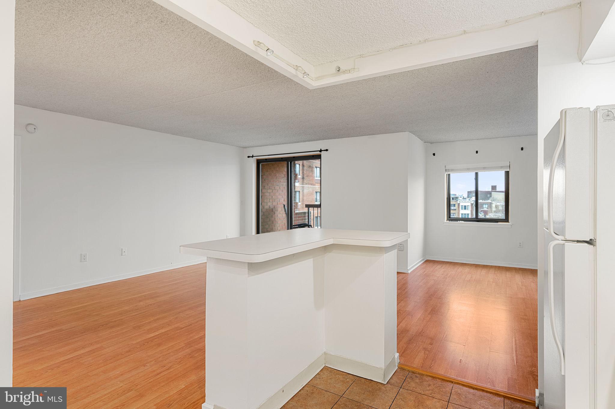 200 Lombard Street, Unit 602 Philadelphia, PA 19147 - Photo 13 of 32 a view of livingroom with hardwood floor and hallway