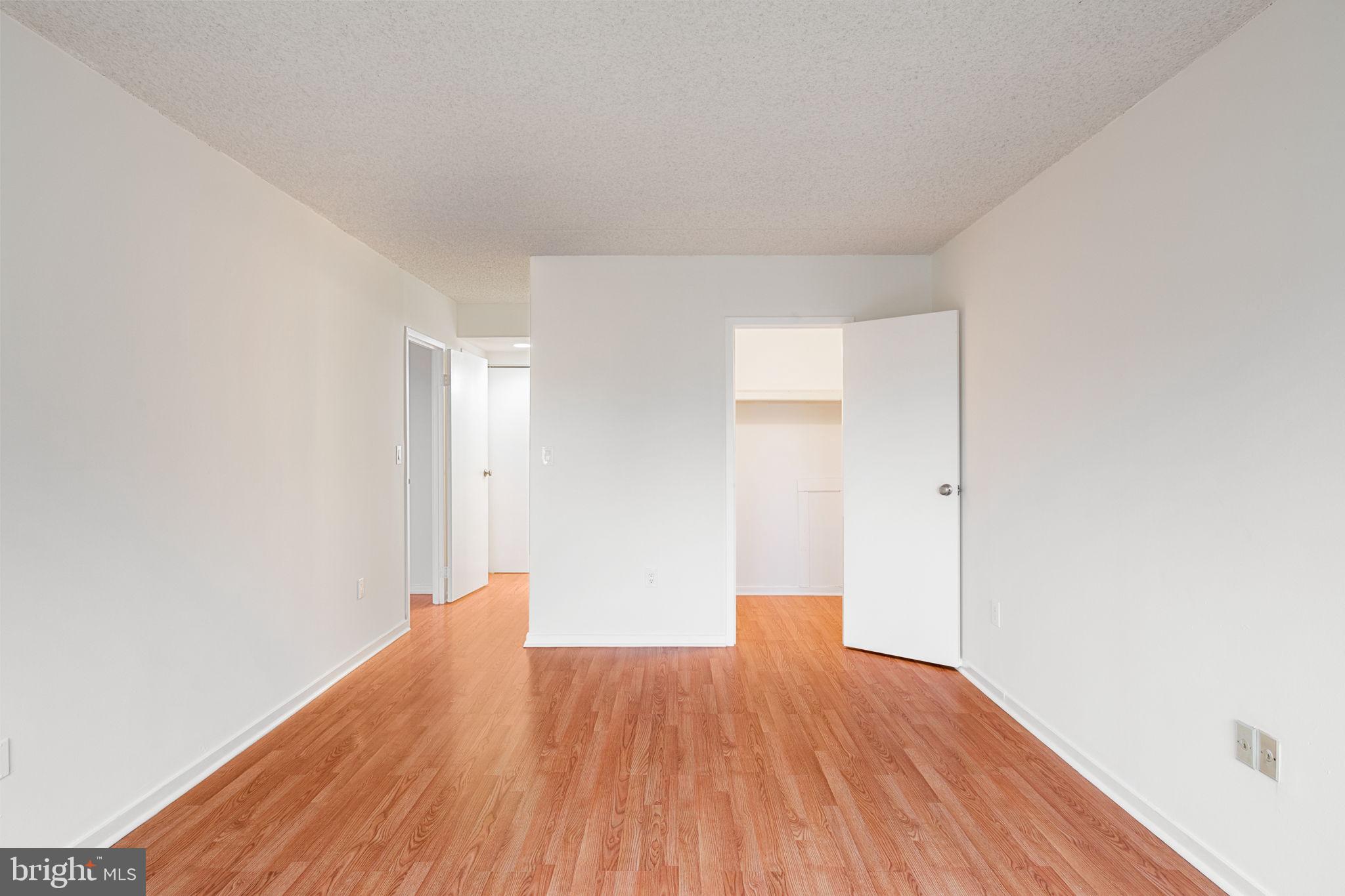 200 Lombard Street, Unit 602 Philadelphia, PA 19147 - Photo 20 of 32 a view of empty room with wooden floor