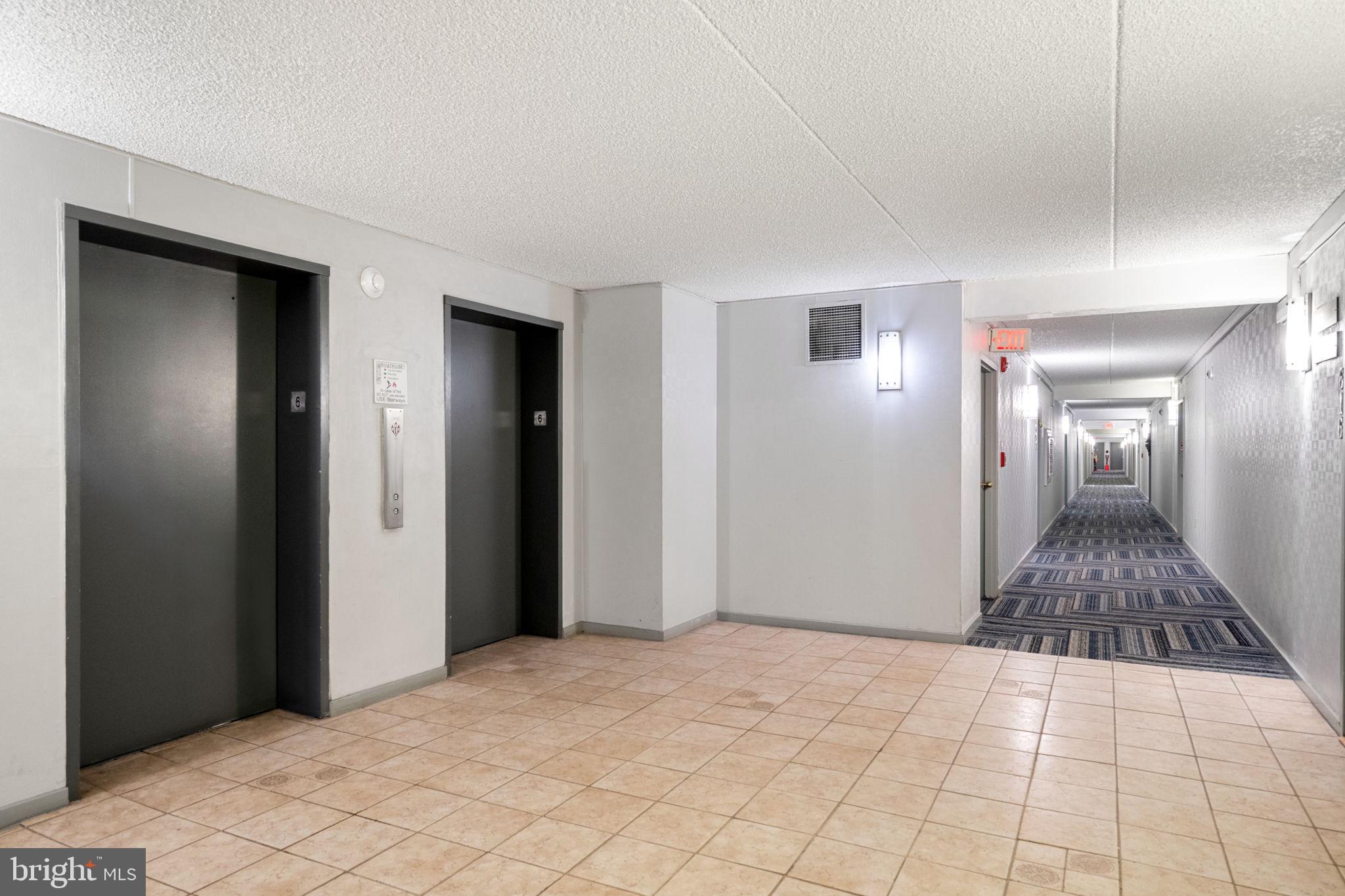 200 Lombard Street, Unit 602 Philadelphia, PA 19147 - Photo 28 of 32 a view of a room with wooden floor and bathroom