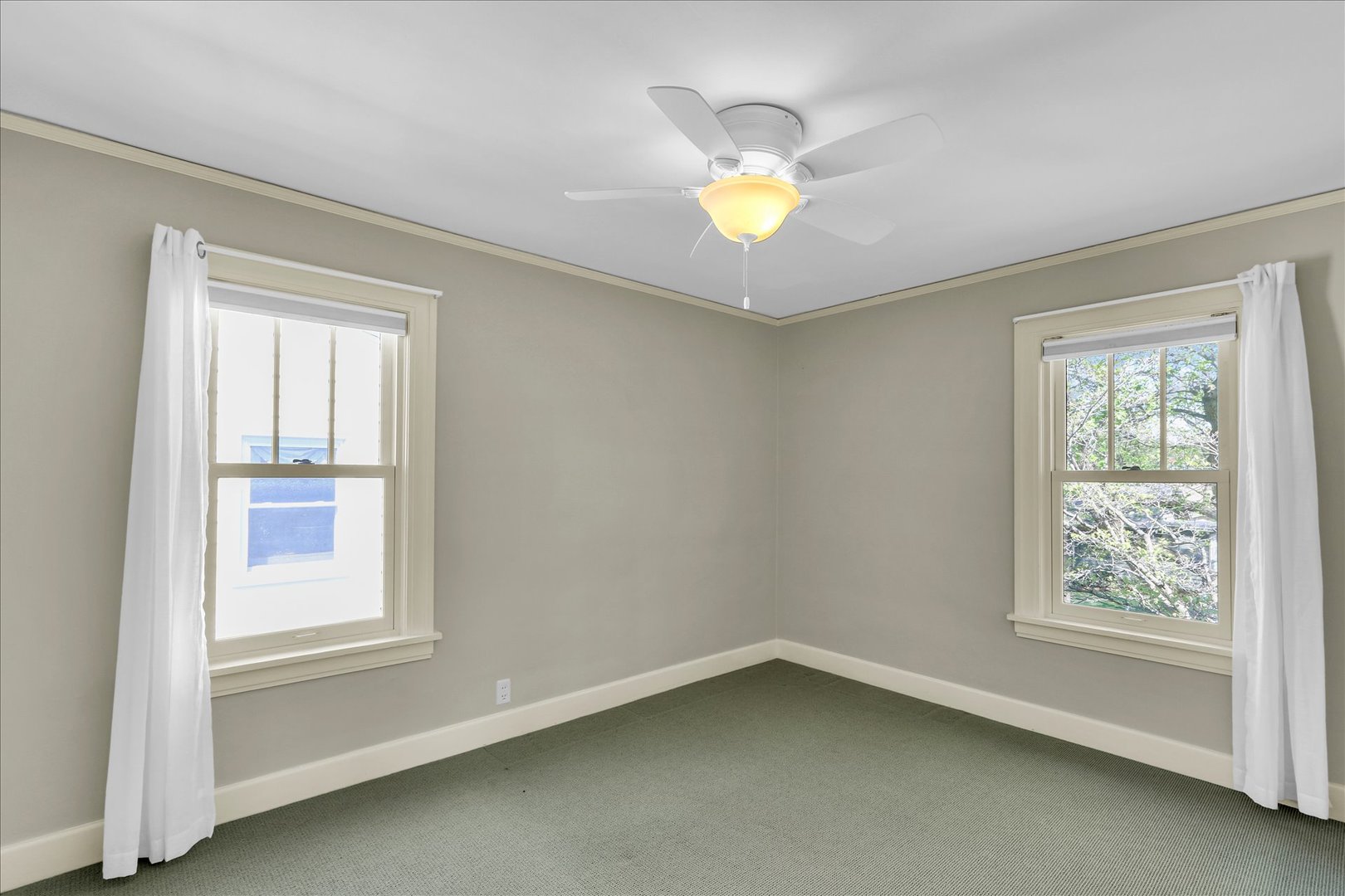 911 West Daniel Street Champaign, IL 61821 - Photo 27 of 44 a view of an empty room with a window