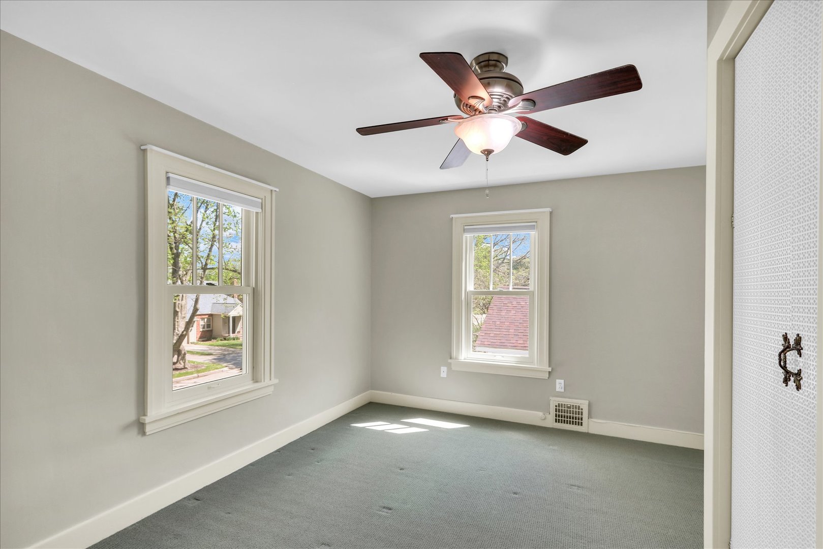 911 West Daniel Street Champaign, IL 61821 - Photo 29 of 44 a view of an empty room with a window