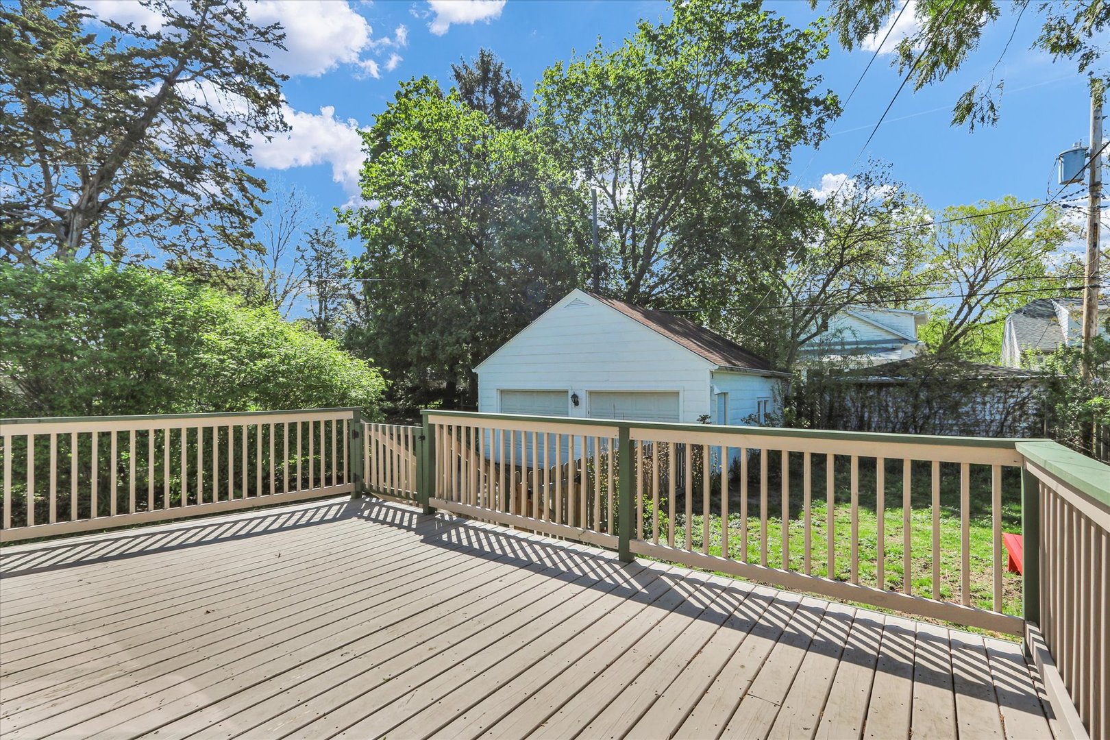 911 West Daniel Street Champaign, IL 61821 - Photo 43 of 44 a view of backyard with deck and wooden floor