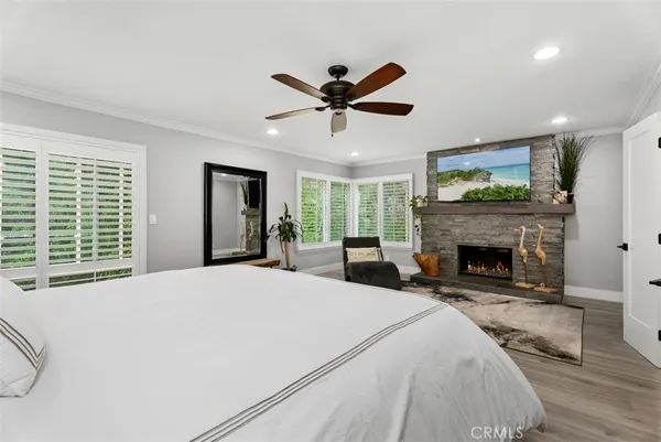 a bed room with a bed and a fireplace