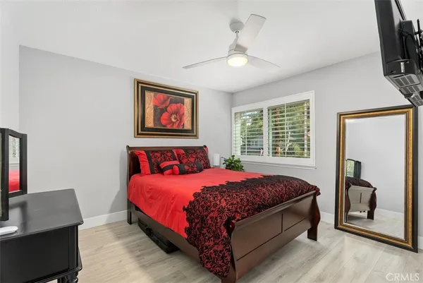 a terrace with outdoor seating and trees