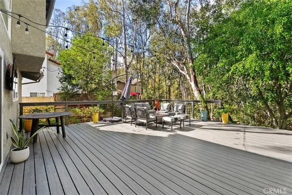 a view of balcony with two chairs and a table