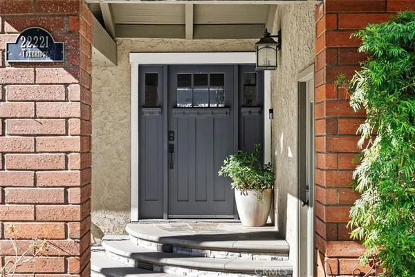 a view of a entryway door front of house