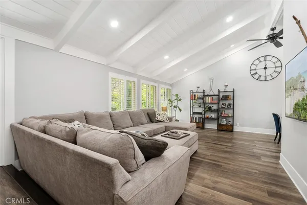 a living room with furniture and a couch
