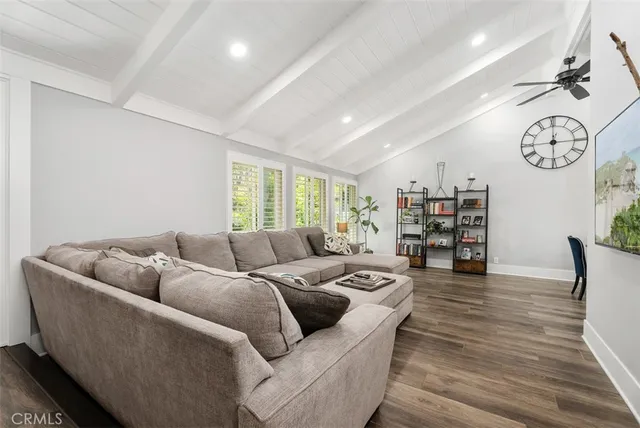 a living room with furniture and a couch