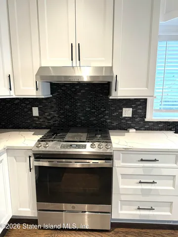 a close view of shoes stand and stove