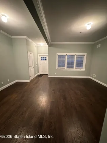 a view of a building with wooden deck