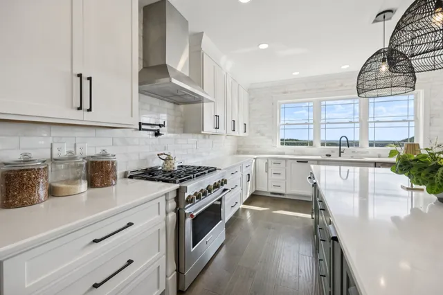 a view of a dining room that has a table and chair