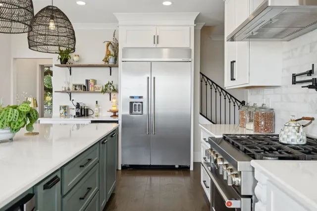 a bedroom with a bed and a mirror