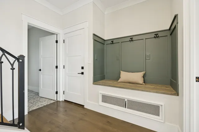 a bathroom with a bathtub a sink a window and a shower