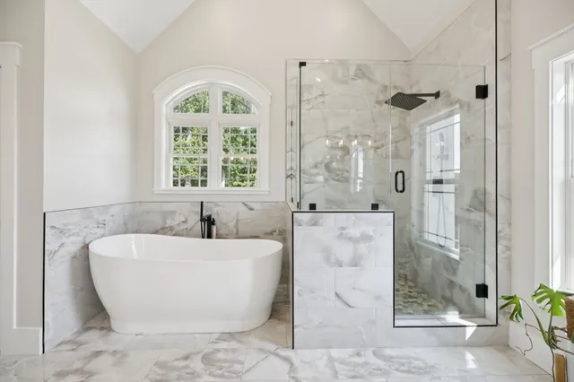 a kitchen with a sink a stove and cabinets