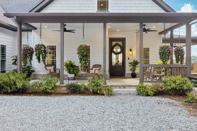 a building outdoor space with furniture and potted plants