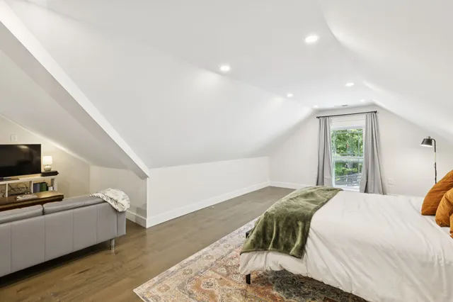 a view of a patio with couches chairs and potted plants