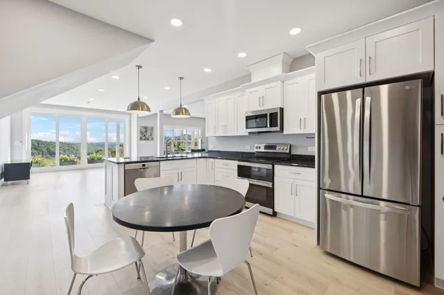 a view of a lake with mountains in the background