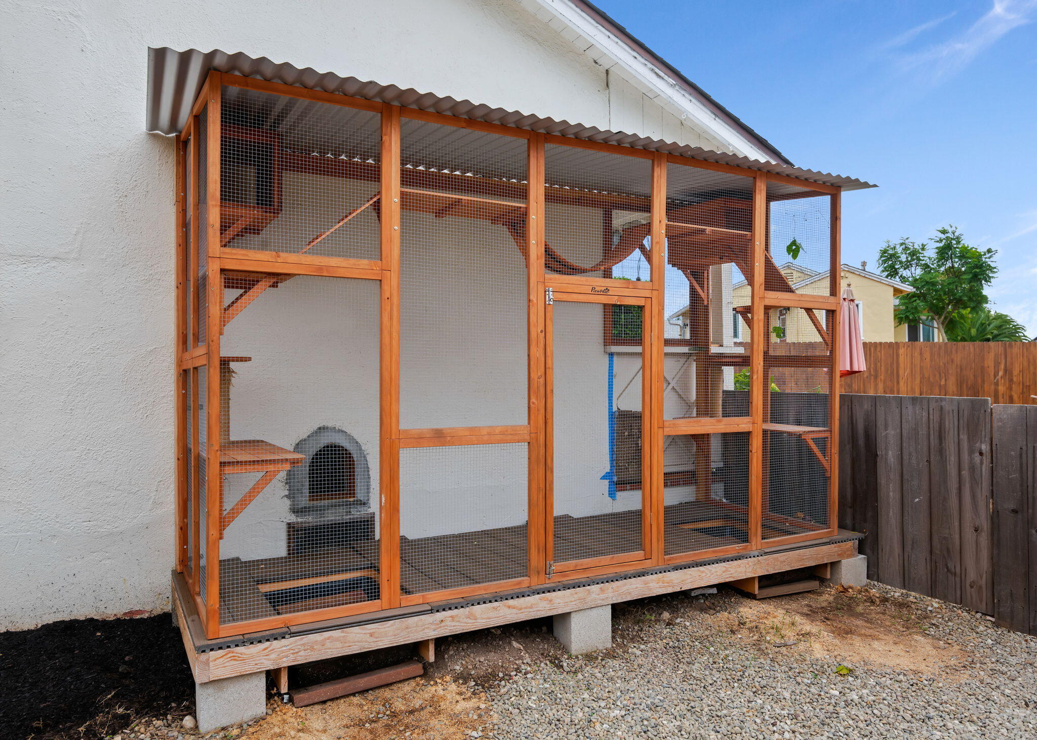 4621 7th Street Carpinteria, CA 93013 - Photo 12 of 16 a backyard of a house with barbeque oven