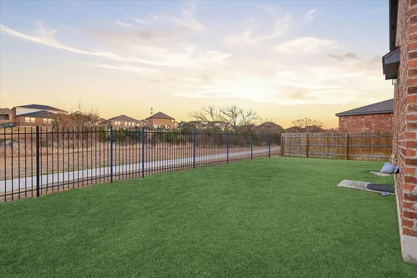 a view of a backyard with a garden