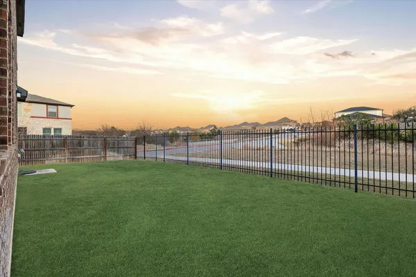 a view of a backyard with a garden
